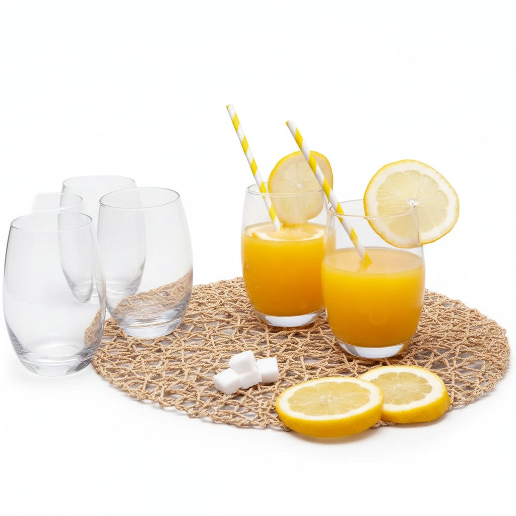 Jogo de copos Nadir Aruba Cucinamup com 6 peças de vidro transparente servindo suco de laranja com rodelas de limão
